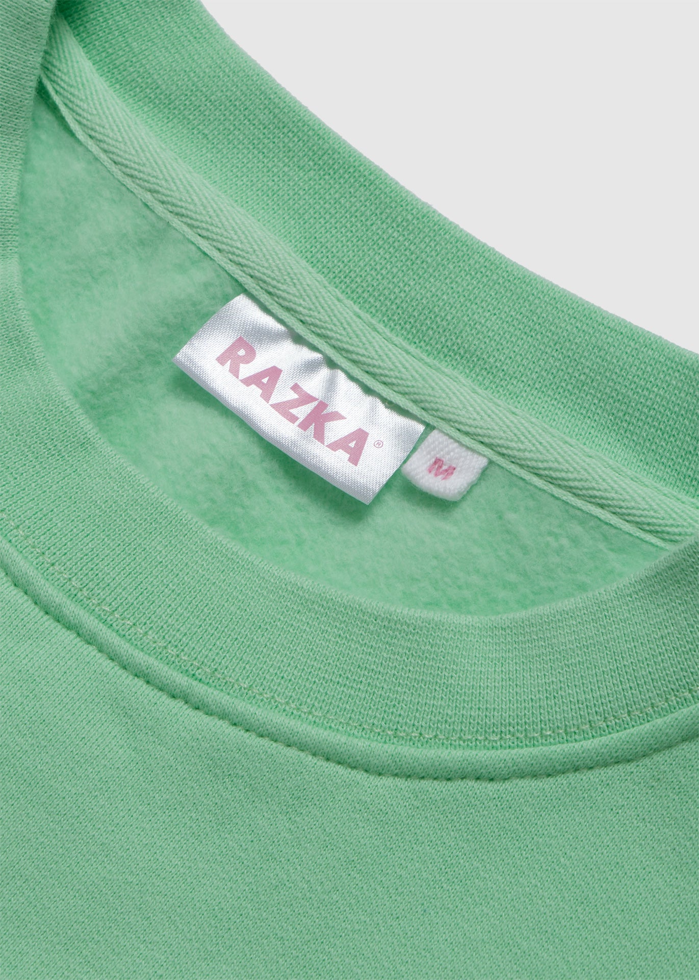 Le pull Vert
