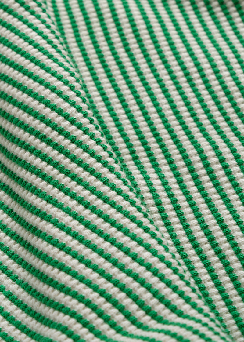 The green sweater